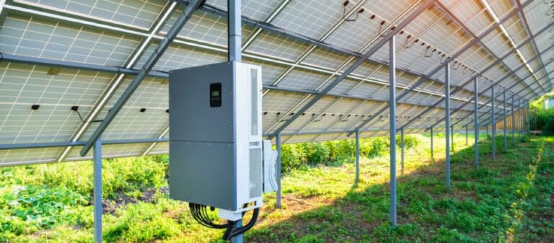 Solar panel inverter under canopy in the backyard made for solar power plant, an ecological alternative source of electricity. Back view