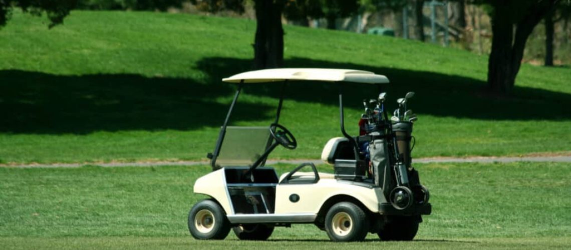 A Golf cart on the fairway of a course